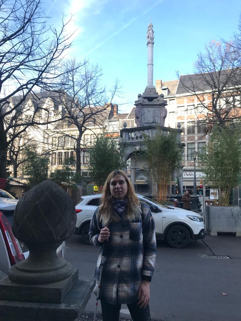 Patricia in front of a monument in Liege