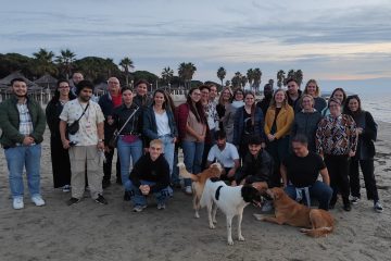 Group picture of the ACT-YOU training participants in Albania, posing on the beach in Durres.