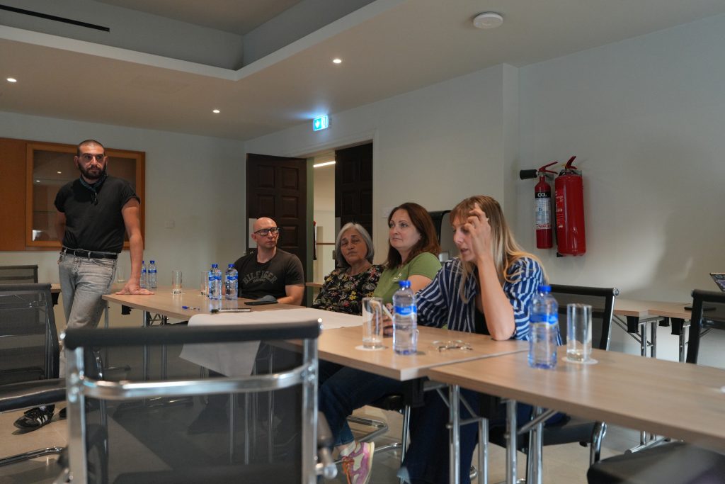 photo during the workshops, a group is talking